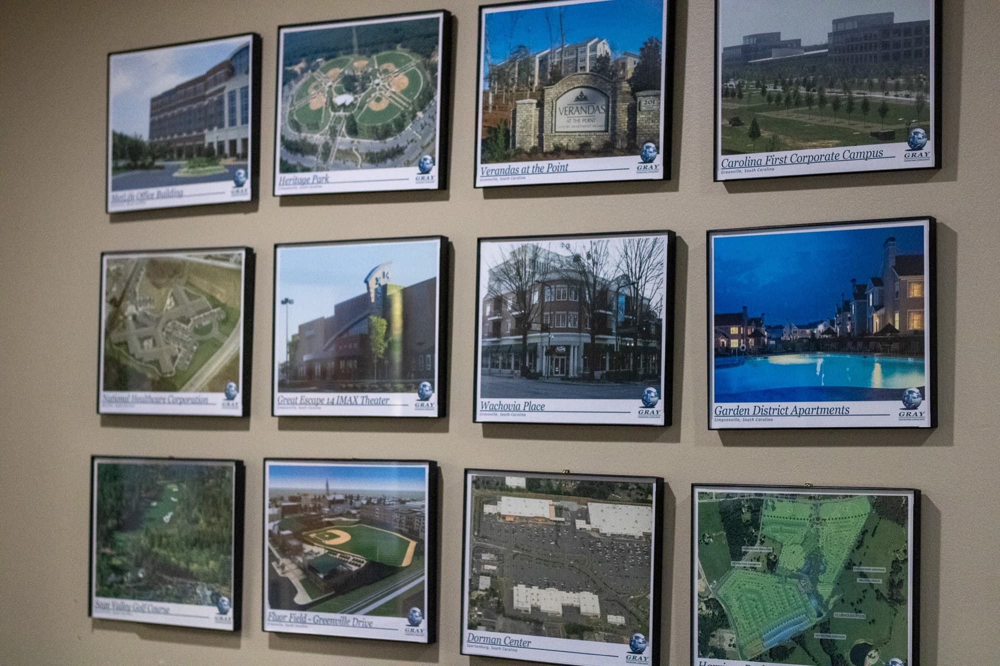 Framed photographs of completed Gray Engineering projects