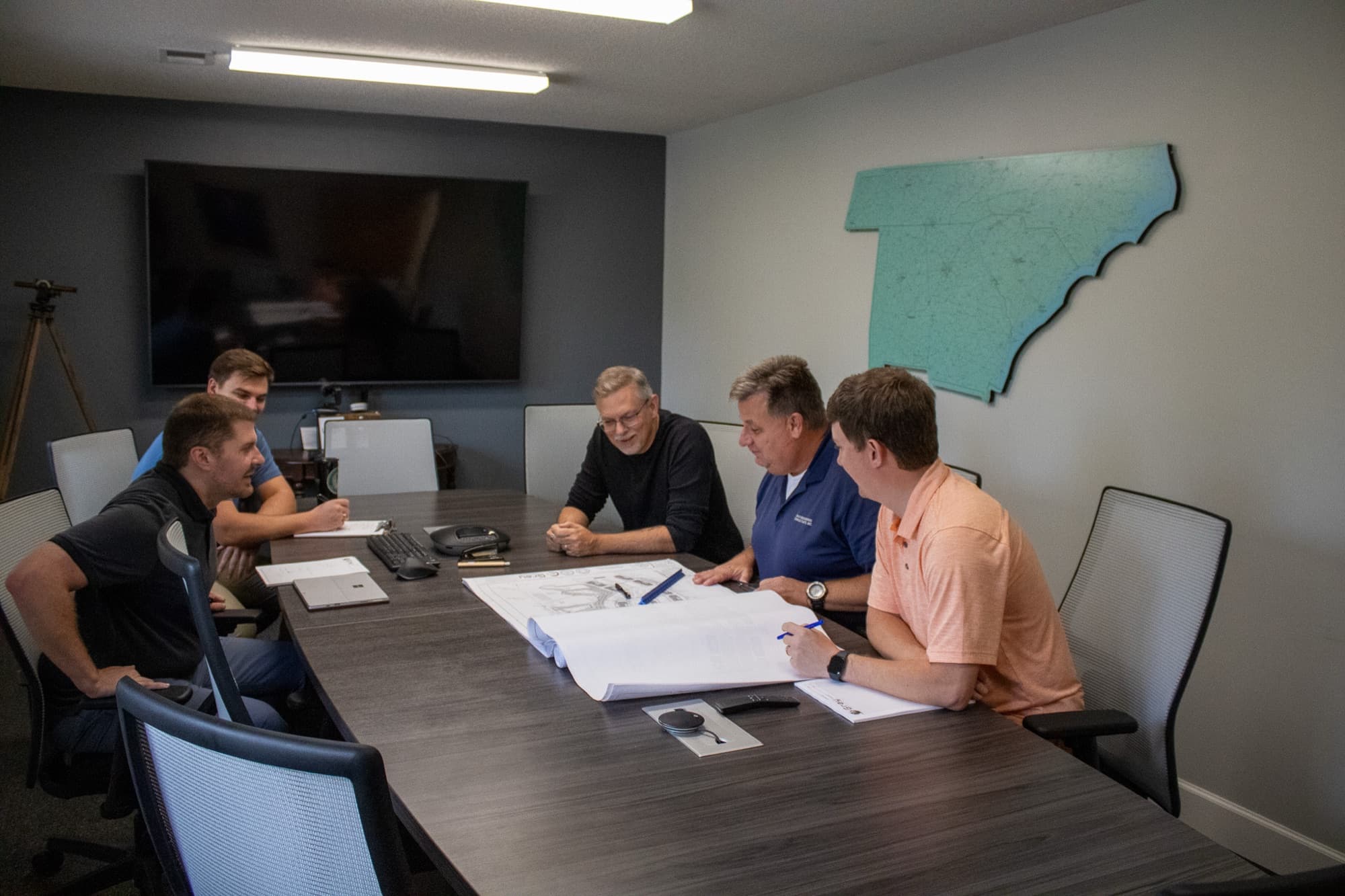 The Gray Engineering team reviewing plans together